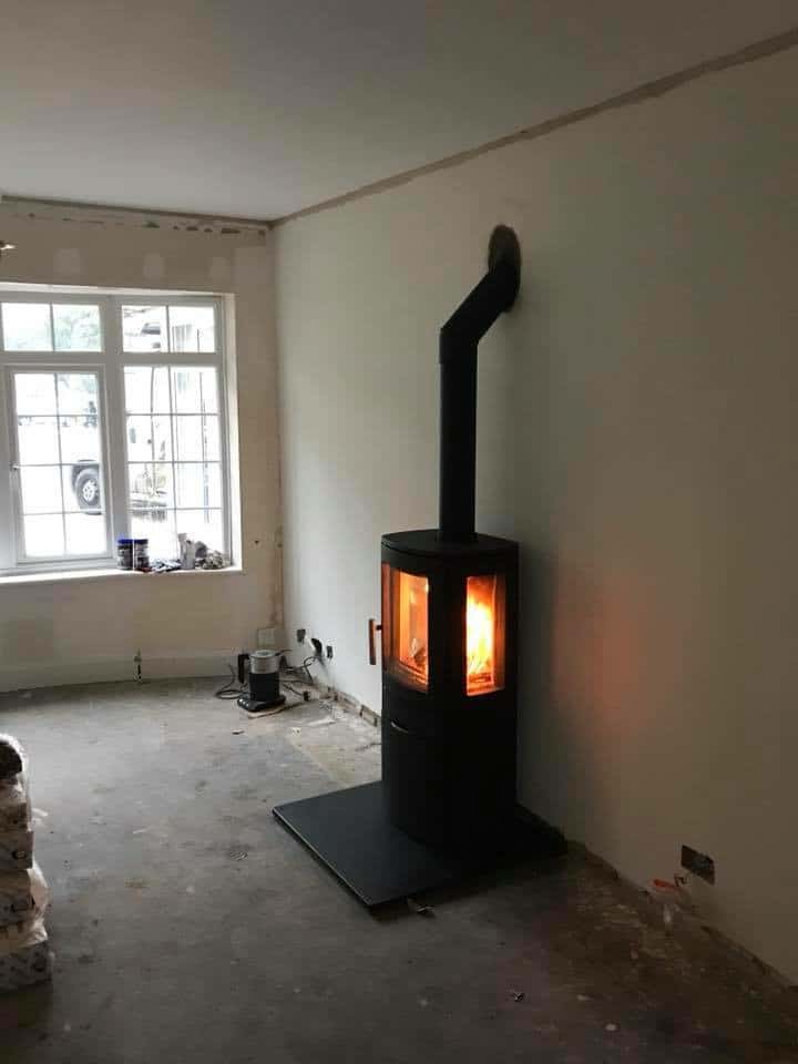 Acr neo 3 multi fuel free standing stove and chimney liner installed in Canterbury Kent.